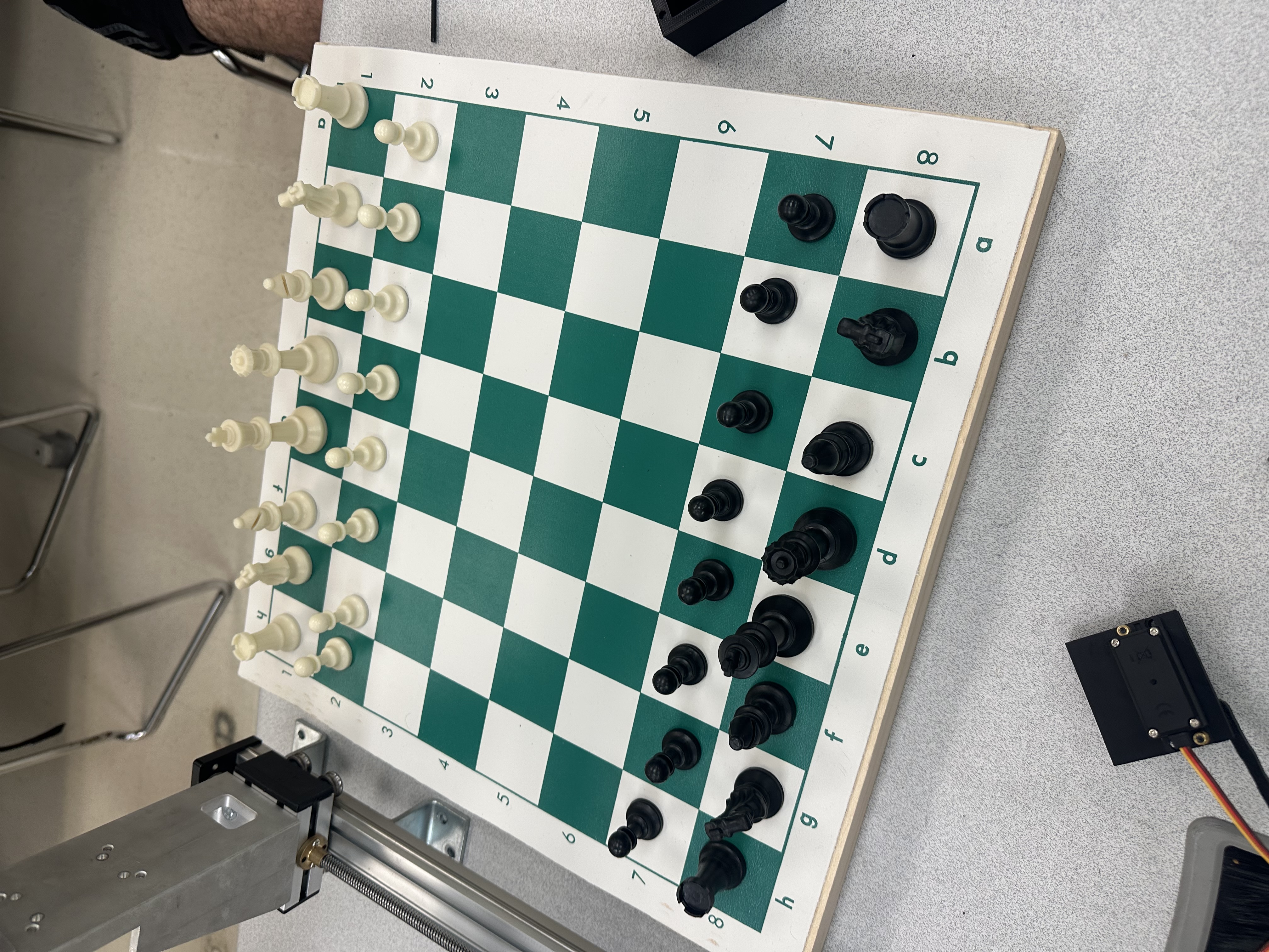 Chessbot: A Low-cost Automated Chess Robot